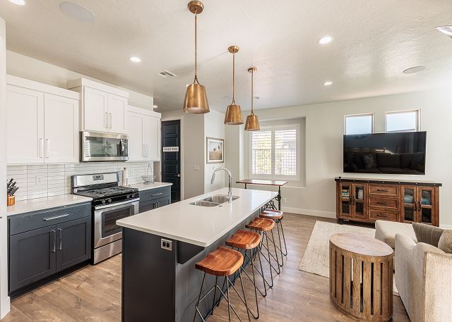 The Kitchen Island comfortably seats 4 adults and creates a great space for serving and preparing meals. 