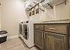 The laundry room has a washer, dryer, iron, ironing board and is stocked with laundry detergent if you desire to wash your clothes during your stay.