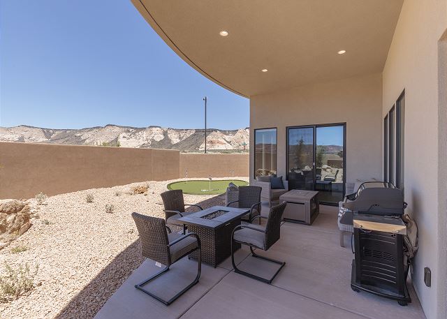 Stay warm next to the fire-pit and relax while watching the sunset over the red mountains.