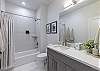 Bathroom 4 includes a tub/shower combo, sink, toilet, and vanity.