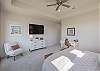 The main bedroom includes a private TV. 