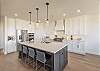 The Kitchen Island comfortably seats 4 adults and creates a great space for serving and preparing meals. 