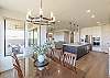With an open and spacious floor plan, the Dining Room and Kitchen can accommodate meal preparations for groups large or small. 