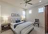 Bedroom 3 is a large bedroom which includes Queen bed, walk-in closet and private TV.