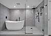 Huge master bathroom with dual vanities, heated and jetted tub, walk-shower, separate water closet and walk-in closet