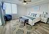 Master bedroom with window view of Bay and sliding glass doors