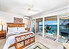 Master bedroom, cozy king sized bed, hear the ocean from your private lanai.
