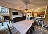 The Dining Table comfortably seats 6 to 8, with a Breakfast Bar that offers seating for 3 to 4 more.