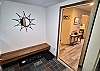 Open the primary door to this entry air-lock area with all the room for your ski or hiking boots etc.