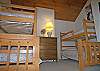 Bedroom with two sets of bunk beds.