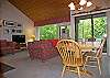 Dining area with view into living area.