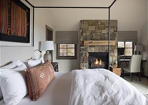 Primary Bedroom - Electric fireplace makes warming up a breeze