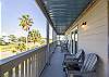 The spacious, private balcony can be accessed from the living area and both bedrooms for convenience. Relax on polywood patio furniture while you sip morning coffee and watch sunrises over Little Lagoon.