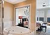 Enjoy a nice soak in the jacuzzi tub after a long day of spending time in the sun.