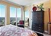 Relaxing views of the Gulf are offered from the primary suite. Balcony access is featured as well.