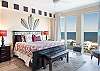 The primary bedroom allows you to enjoy endless views of the Gulf as you rest comfortably in the luxurious king bed.