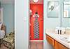 The private bathroom features a spacious closet for storing your personal items out of sight.