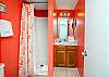 The main level features a full bathroom which includes a standing shower, single vanity, and is fully stocked with linens for your stay.