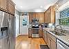 The spacious kitchen is fully stocked with all items needed for meal prepping during your stay. 