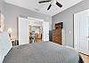 Guest bedroom 2 offers Queen bedding and plenty of storage for your personal belongings.