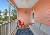 Each cottage offers a screened porch for enjoying outdoors without having to battle the elements. Seating is provided for relaxation.