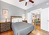 Guest bedroom 2offers Queen bedding, bedside tables with lamps and is conveniently located off the main living area of the cottage.