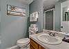 Bathroom 2 offers a single vanity, standing shower and is fully stocked with linens for your stay