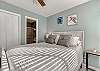 Bedroom 1 offers a new queen bed, new bedding and 2 bedside tables