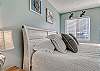 Bedroom 1 offers a new queen bed and new bedding