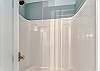Bathroom 2 offers a standing shower and is fully stocked with linens for your stay