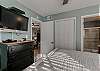 Bedroom 1 offers a closet and a private bathroom