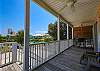 French doors from the living area open to this spacious balcony that overlooks Stanton Creek. Seating is provided and offers a great space for relaxing with your morning coffee or evening cocktail.