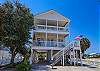 Coast A While is a 4 Bedroom, 3 & 1/2  bathroom, pet friendly home located off West Beach in Gulf Shores.