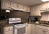 The kitchen features granite counter tops and also offers small appliances such as an automatic drip coffee maker, blender and toaster for your convenience