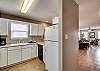 From this angle, you can see just how this entire space is laid out. As you cook in the kitchen, you can also join in on the conversations of the living area.