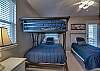 The Guest Bedroom offers Full over Full Bunk Beds and also a Twin Bed. This room sleeps 5 and offers a Private Bathroom.