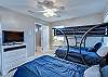 The Guest Bedroom offers Full over Full Bunk Beds, a Twin Bed, & 37