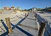 A boardwalk is built to take you over the sand dunes from the property to the beach so that it makes for an easier walk