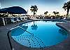 Steps are provided in the outdoor pool for easy entry and exit