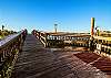 The boardwalk leading you to the beach offers showers for the convenience of leaving all sand where it belongs
