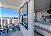 The bedroom offers private balcony access 