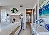 The bedroom offers queen bedding and plenty of storage for your personal belongings