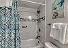 The bathroom offers a tub/shower combo and is fully stocked with linens for your stay