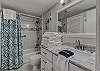 The bathroom offers a single vanity, tub/shower combo and is fully stocked with linens for your stay. The bathroom also features a stack washer/dryer for convenience