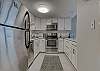 The kitchen offers Granite counter tops, stainless appliances and is fully stocked with all of the items needed to prepare any meal.