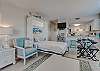 Unit 469 has a murphy bed hidden in a cabinet in the living area offering extra sleeping space for additional guests