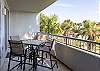 The spacious balcony features a table with seating for 4 and is the perfect space for enjoying time outdoors with a gorgeous view.