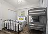 Bedroom 2 features a Queen bed and also a set of bunks to easily sleep 4 guests.  