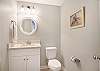 A half bathroom is provided, which features a single vanity. Each bathroom is fully stocked with linens for your stay.