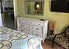 The Gulf Front Bedroom offers a chest of drawers for storing your personal belongings and a mounted flat screen television